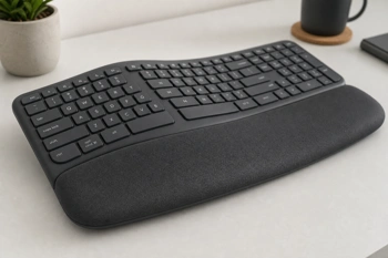 Four ergonomic keyboards with integrated palm rests that reduce strain during extended typing.